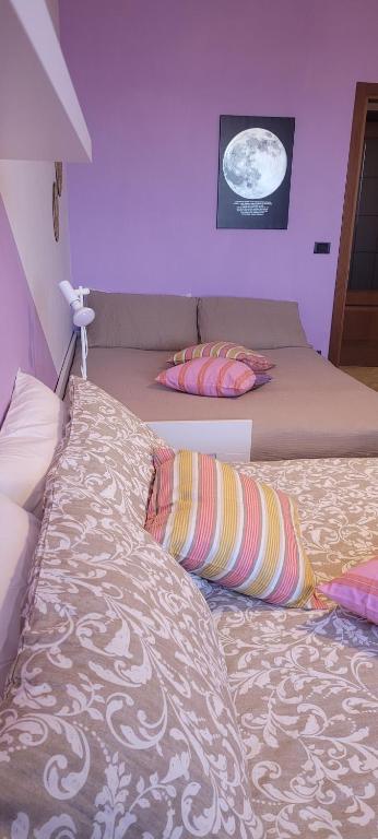 Ένα ή περισσότερα κρεβάτια σε δωμάτιο στο Appartamento Albachiara