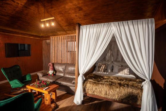 Χώρος καθιστικού στο Caseddu SPA Chalet