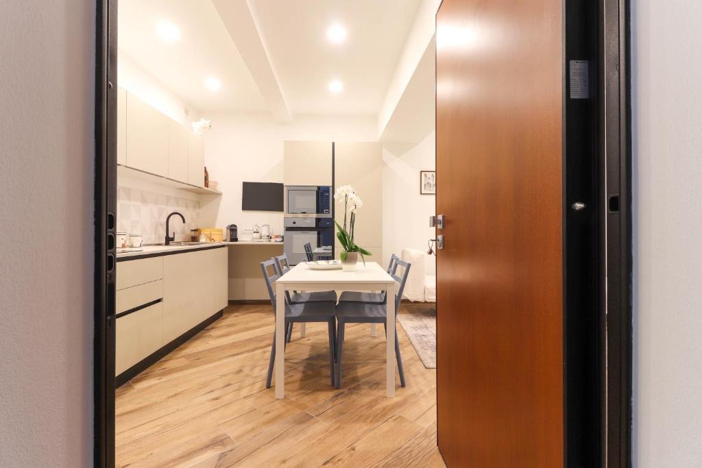 Kuchyň nebo kuchyňský kout v ubytování Appartamento 2 Leoni