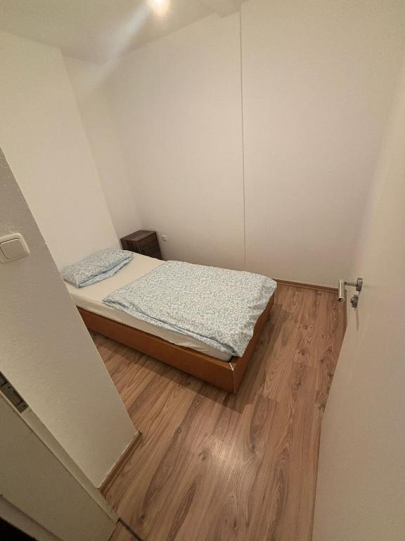 En eller flere senge i et værelse på Speedstay oberhausen