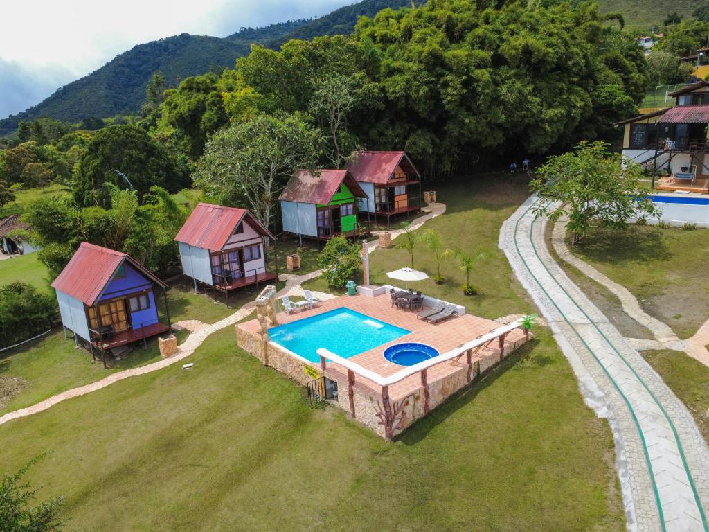 an aerial view of a house with a swimming pool at Cabaña Sol in Calimita