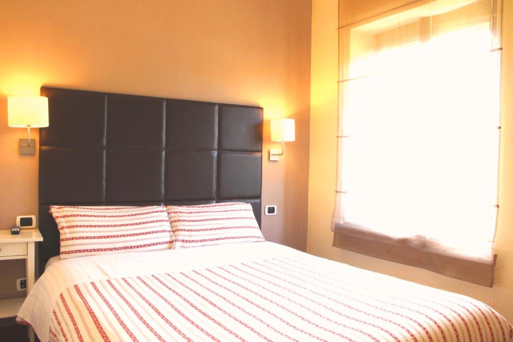 Postel nebo postele na pokoji v ubytování B&B da Peppe
