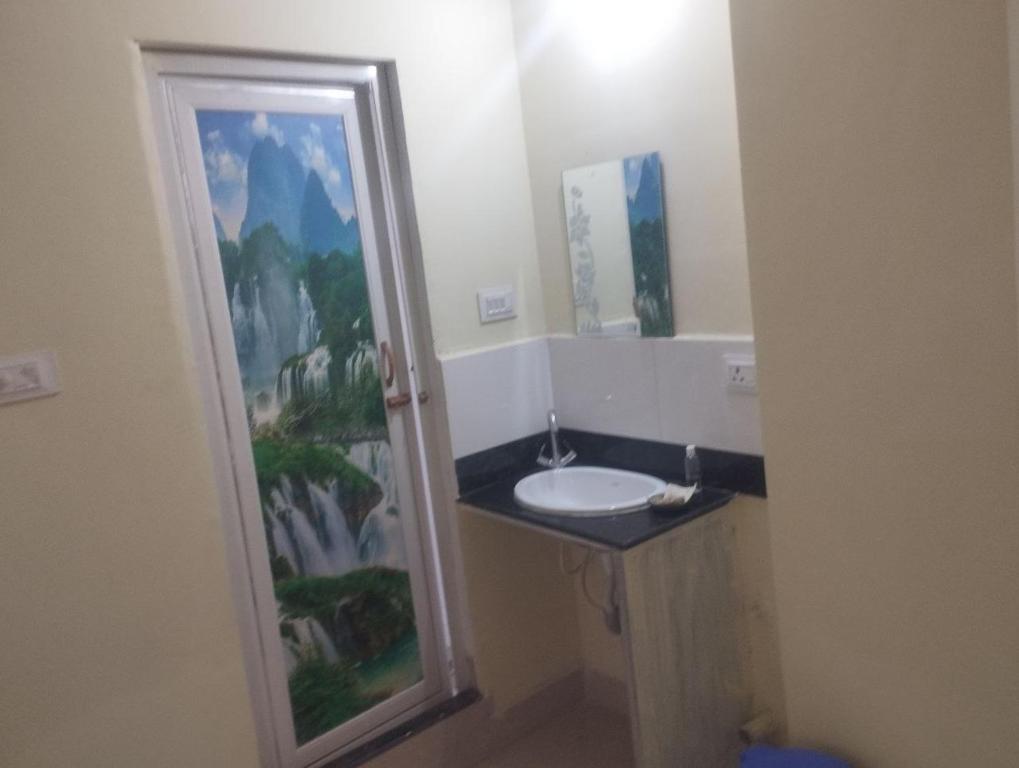 Ένα μπάνιο στο 2 Bedroom Shreeji Kunj