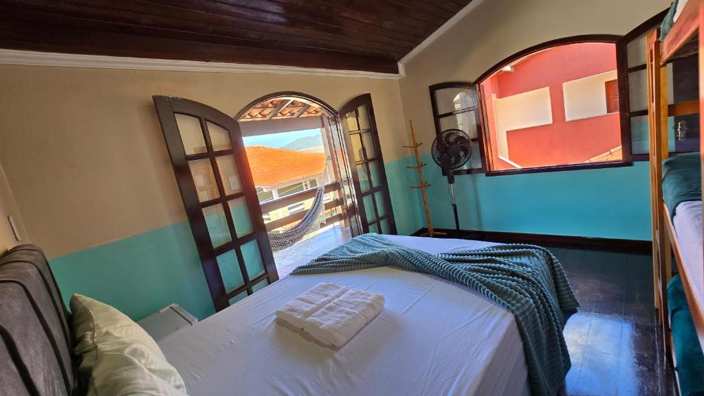 Postel nebo postele na pokoji v ubytování Almar Hospedagem 2 ARRAIAL DO CABO