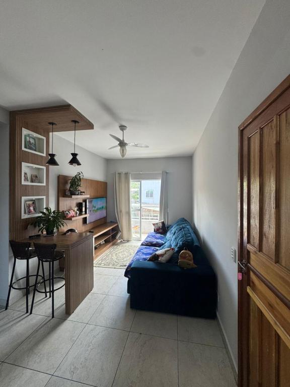 Фотография из галереи Apartamento em Matinhos aconchegante в городе Матиньюс