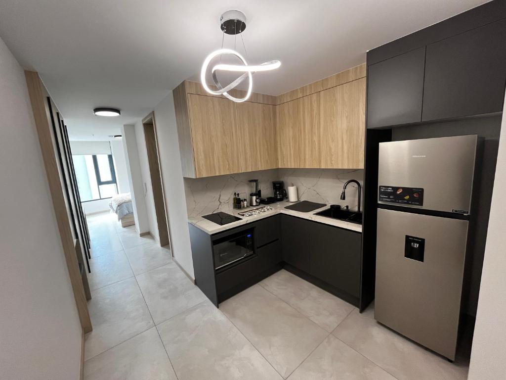 Kuchyň nebo kuchyňský kout v ubytování Suite ejecutiva - Trabajo y Descanso - Exclusividad y Lujo - Sector La Carolina, Quito