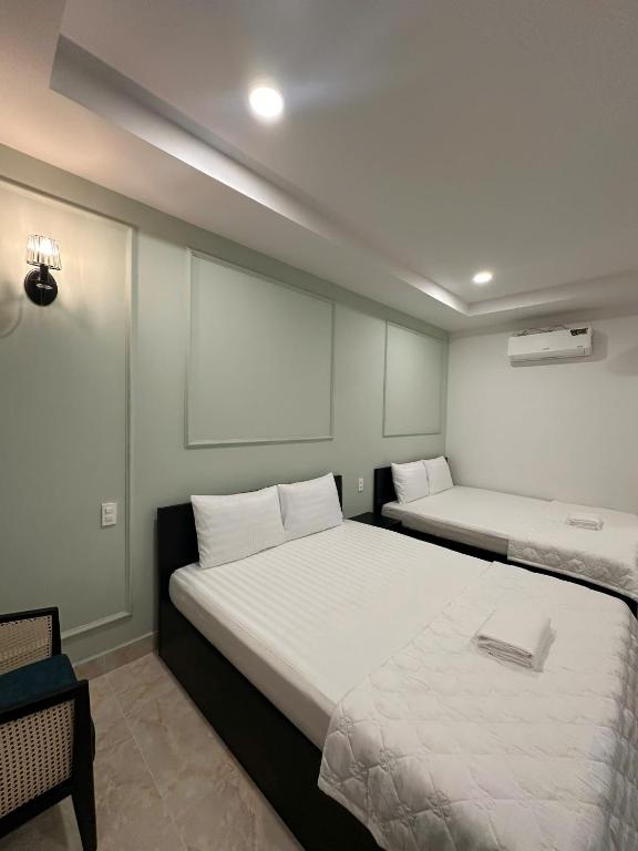 Phu Gia Hotel 13-15 Hoàng Quốc Việt - Deluxe Family Room