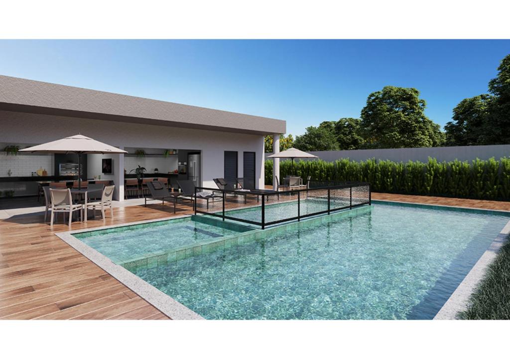 Bazén v ubytování Vila das Orquídeas nebo v jeho okolí