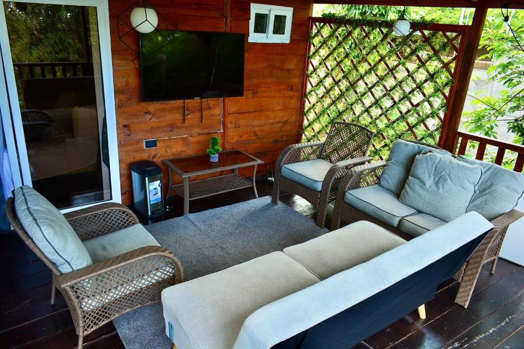 TV a/nebo společenská místnost v ubytování La Cabaña 0301