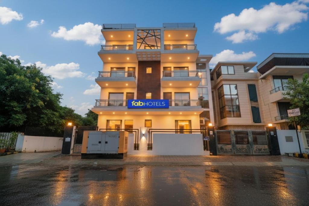a building with a sign that reads condos at FabHotel Gazelle Studios in Gurgaon