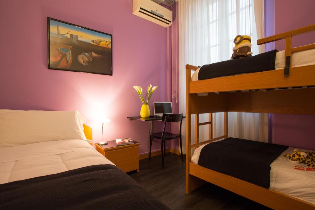 Postel nebo postele na pokoji v ubytování Albergo Giardino