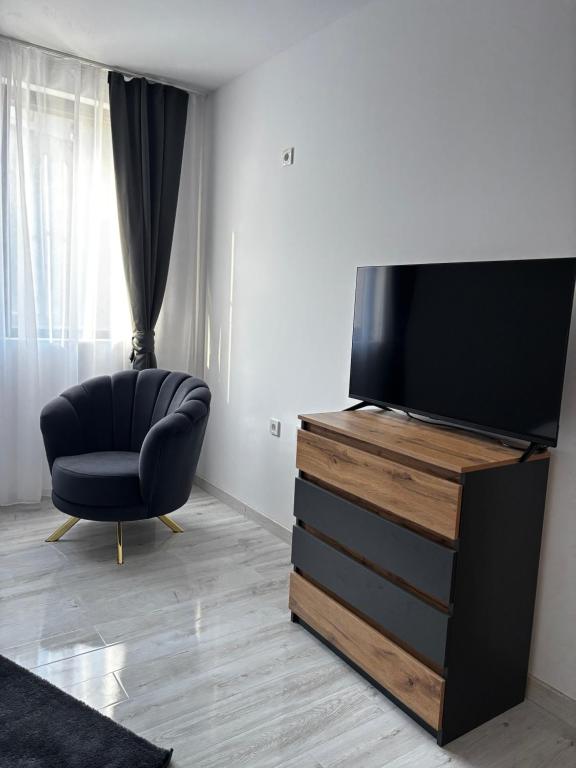 Et tv og/eller underholdning på Thermal Bliss Apartment