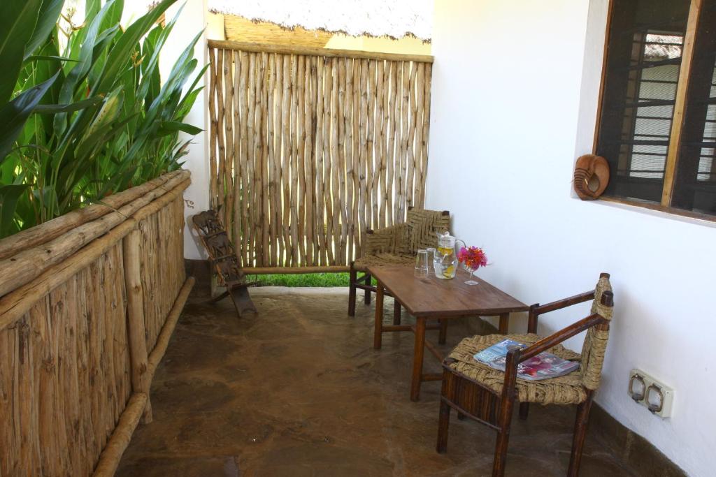 Posezení v ubytování Sheba Cottages - Diani Beach