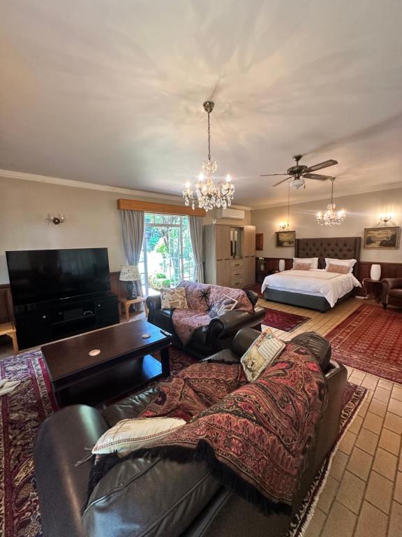 Postel nebo postele na pokoji v ubytování Garden Court