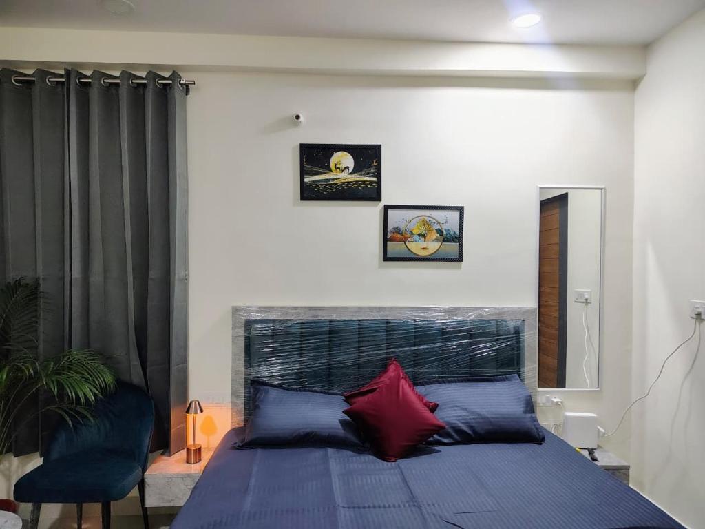 En eller flere senge i et værelse på The Velvet Rooms