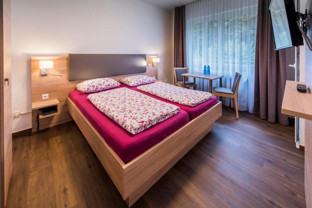 Postel nebo postele na pokoji v ubytování Hotel Baccara