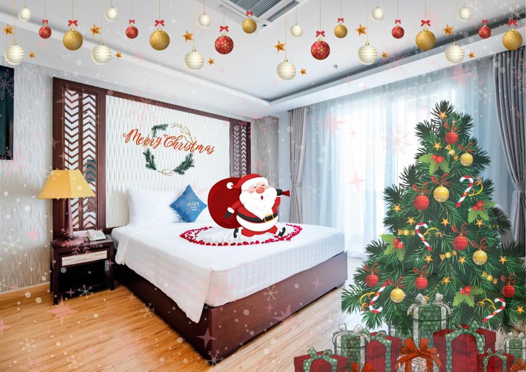 Ένα ή περισσότερα κρεβάτια σε δωμάτιο στο Galliot Hotel Nha Trang