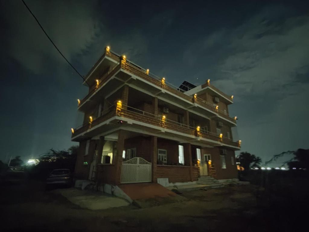 a house with lights on top of it at night at Virudravilla in Jodhpur