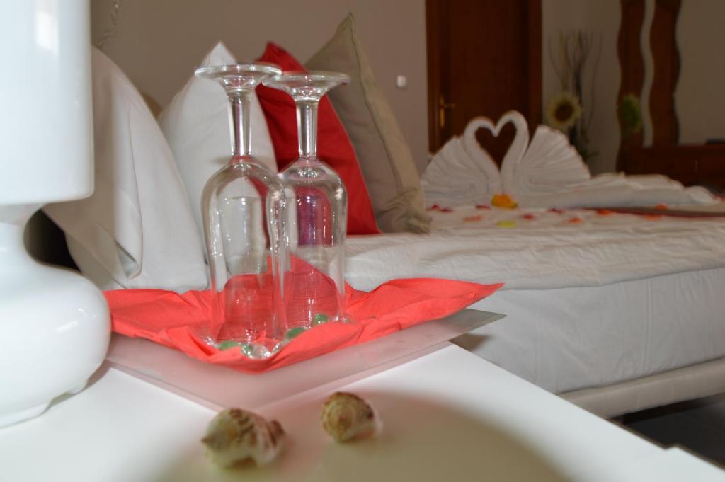 Postel nebo postele na pokoji v ubytování Hotel Argos