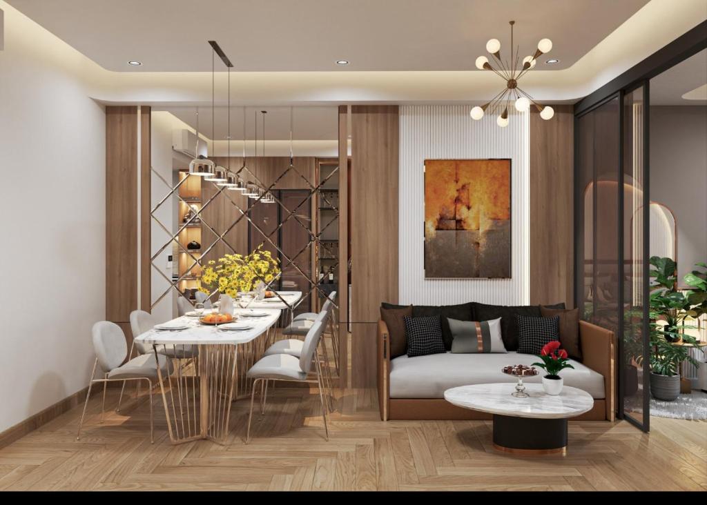 a living room with a table and a couch at CBD Luxury Apartment in Rivergate Tower in Ho Chi Minh City