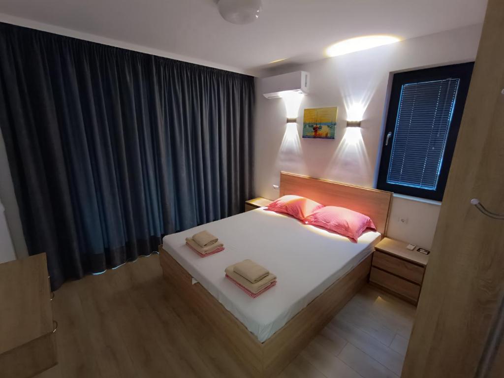 Ένα ή περισσότερα κρεβάτια σε δωμάτιο στο Апартамент 10 улица Македония 33