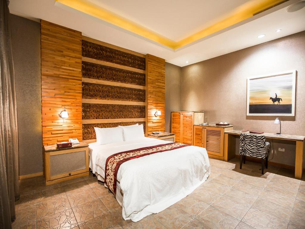 Postel nebo postele na pokoji v ubytování Moon Area Motel