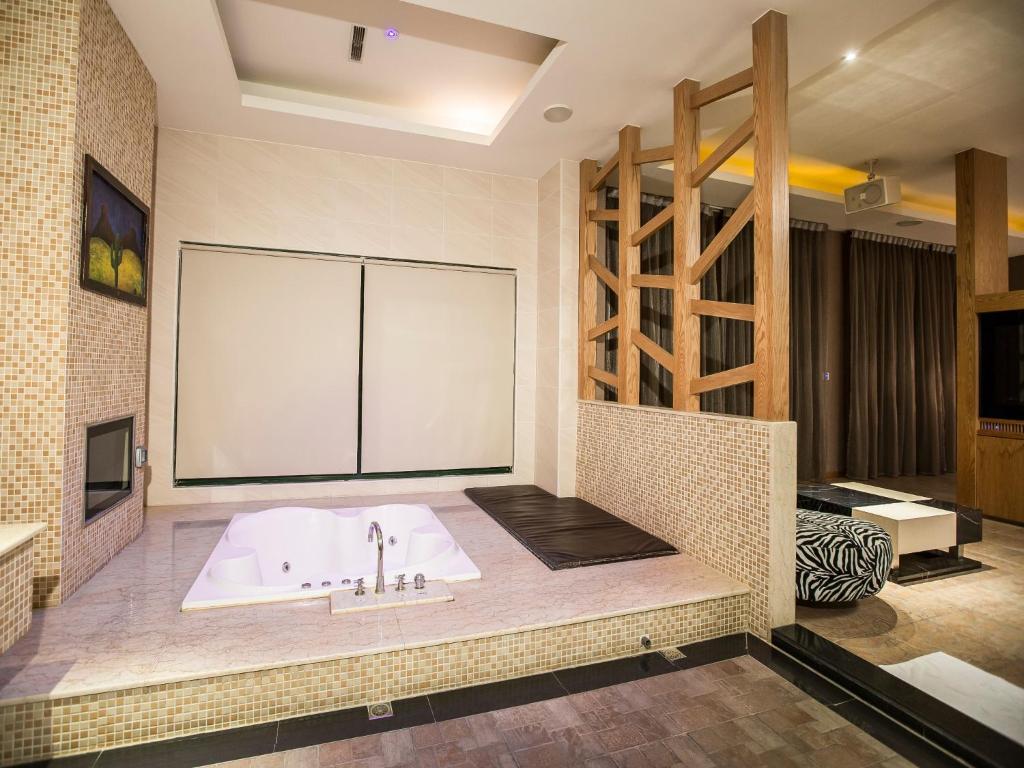 Postel nebo postele na pokoji v ubytování Moon Area Motel
