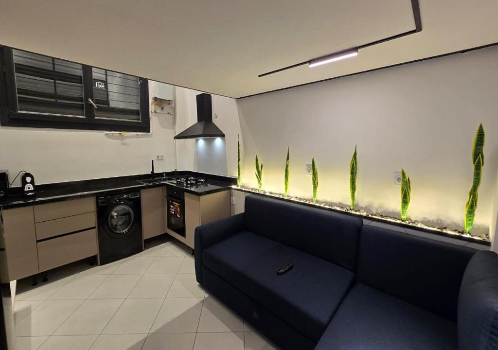 Kuchyň nebo kuchyňský kout v ubytování Petit cocon moderne à Akid Lotfi