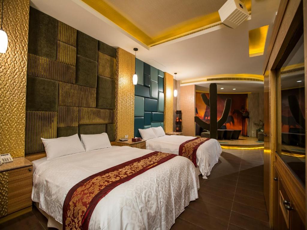Postel nebo postele na pokoji v ubytování Moon Area Motel