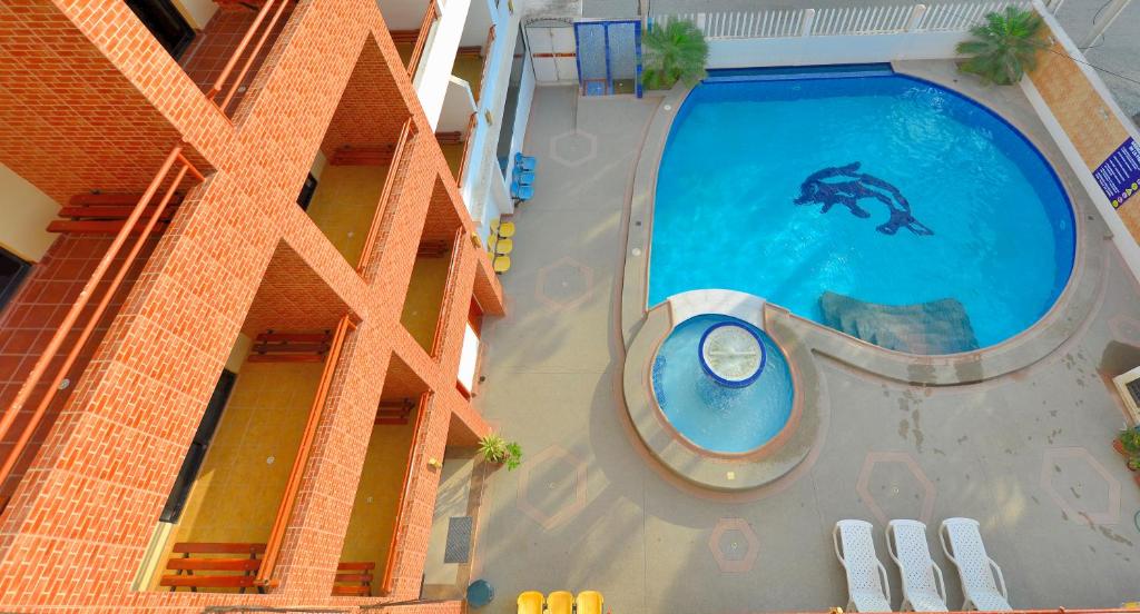 Bazén v ubytování Hotel La Aldea nebo v jeho okolí