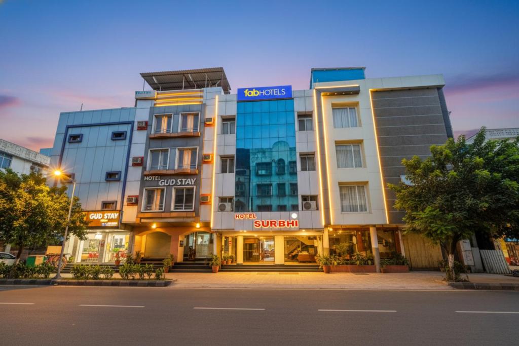 a building with a sign on the front of it at FabHotel Surbhi in Bhopal