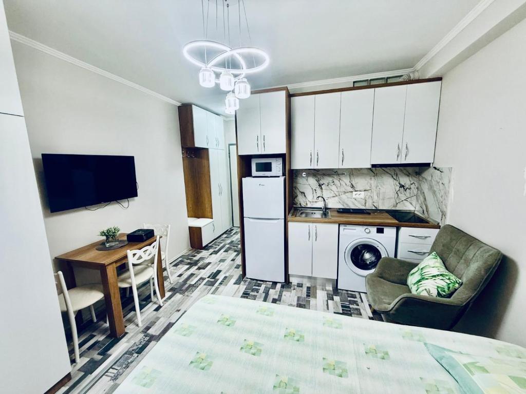 Kuchyň nebo kuchyňský kout v ubytování City Centre Apartment