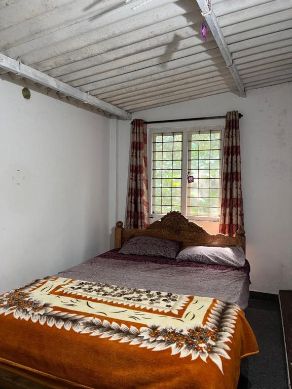 Postel nebo postele na pokoji v ubytování Wild garden home stay