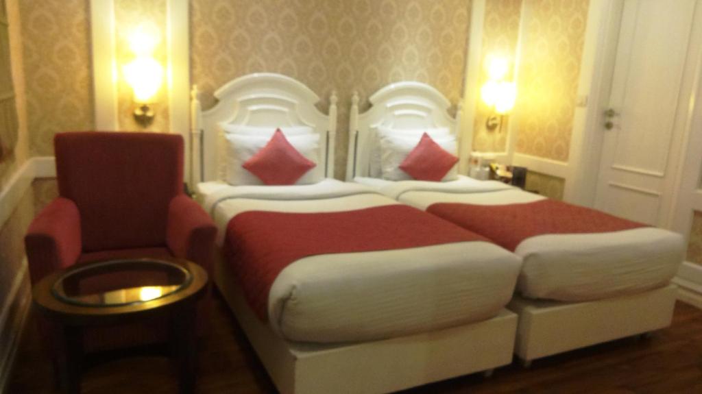 Postel nebo postele na pokoji v ubytování Hotel Bright