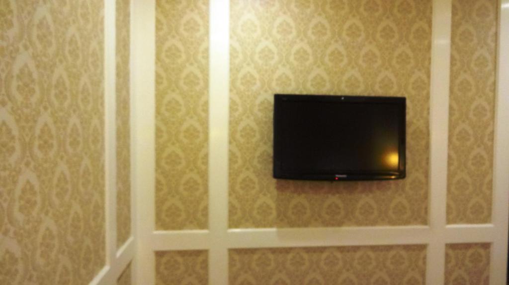 TV a/nebo společenská místnost v ubytování Hotel Bright