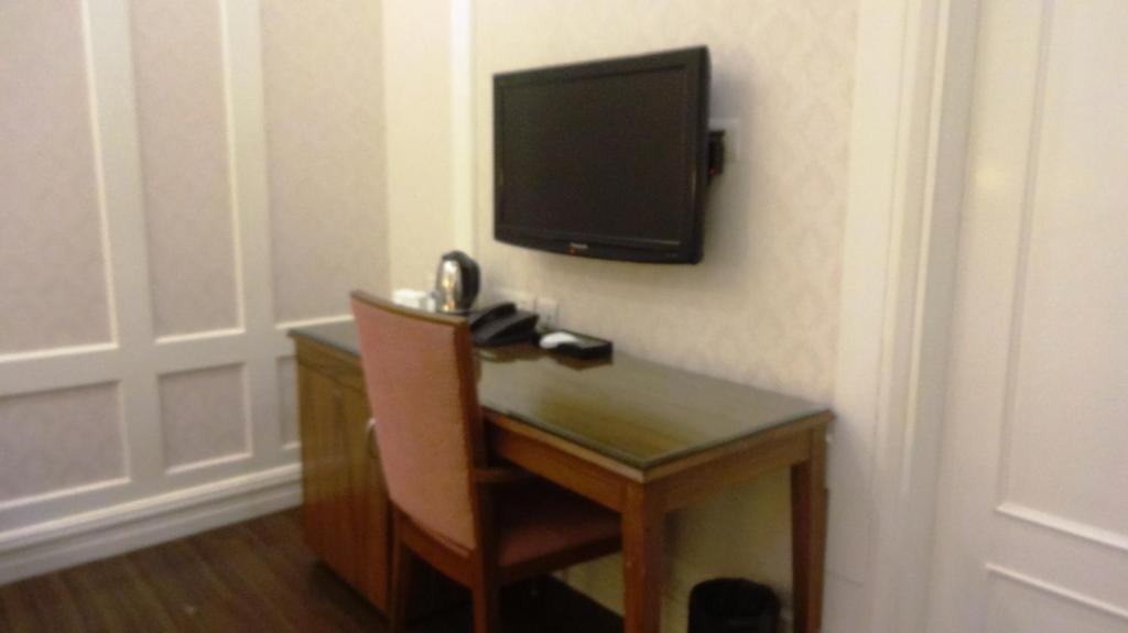 TV a/nebo společenská místnost v ubytování Hotel Bright