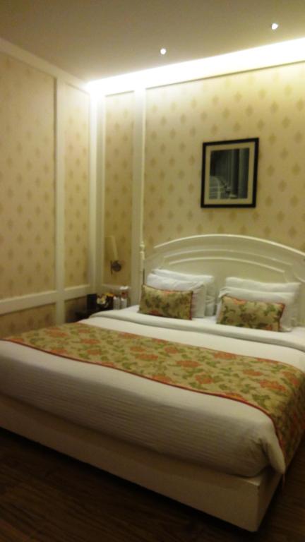 Postel nebo postele na pokoji v ubytování Hotel Bright