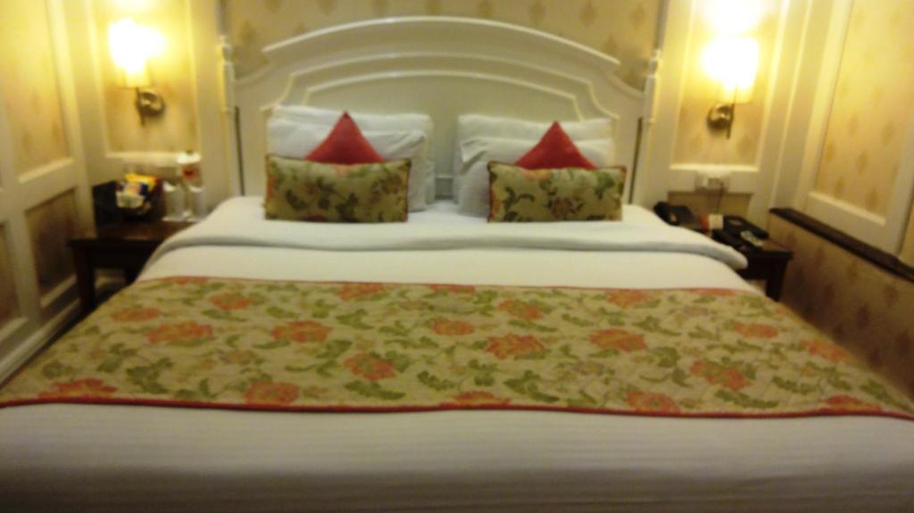 Postel nebo postele na pokoji v ubytování Hotel Bright