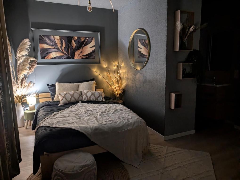 Ένα ή περισσότερα κρεβάτια σε δωμάτιο στο Duplex Le Glamour proche hyper centre