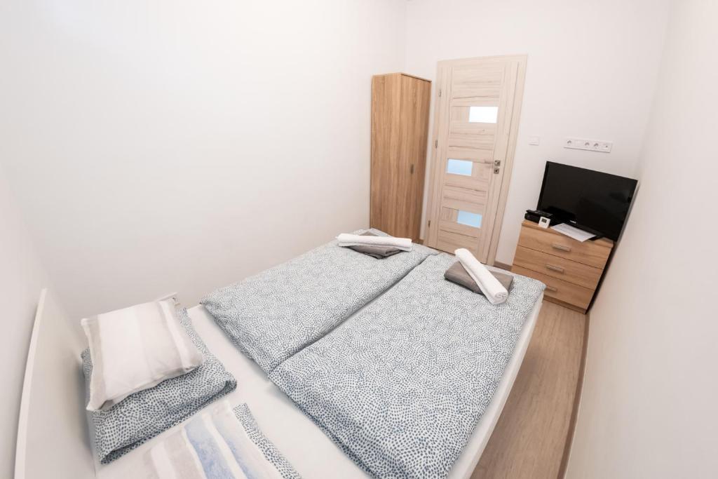 Ένα ή περισσότερα κρεβάτια σε δωμάτιο στο DowntownKate