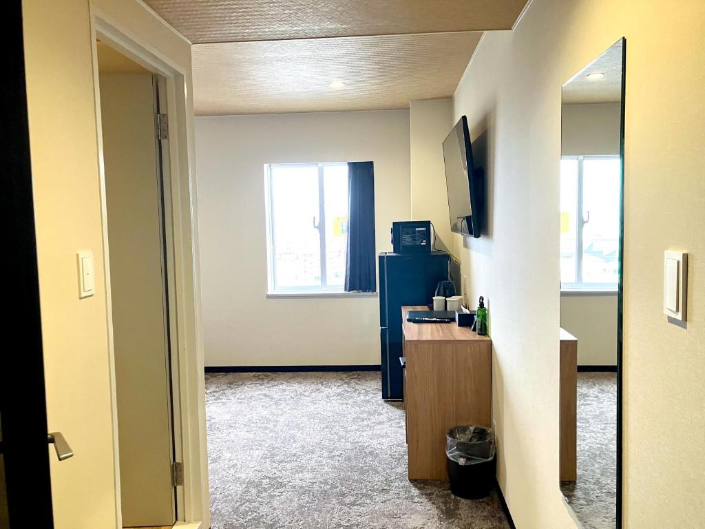 HOTEL LiVEMAX BUDGET Iyo Mishima - Deluxe Tweepersoonskamer Met 2 Aparte Bedden