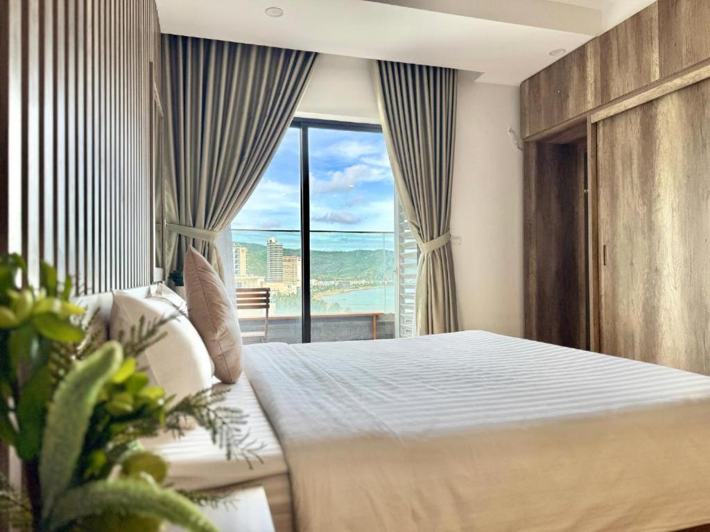 Ένα ή περισσότερα κρεβάτια σε δωμάτιο στο Quy Nhon TMS cosy apartment