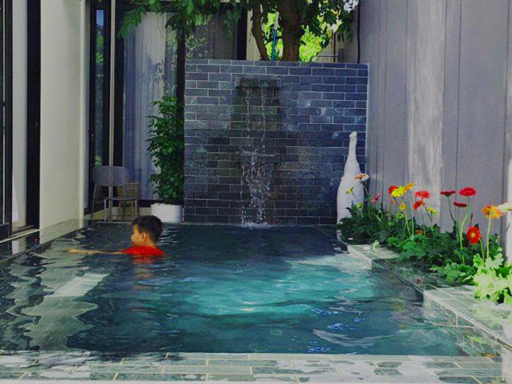 Bazén v ubytování Private Villa by YUSETH Residence nebo v jeho okolí