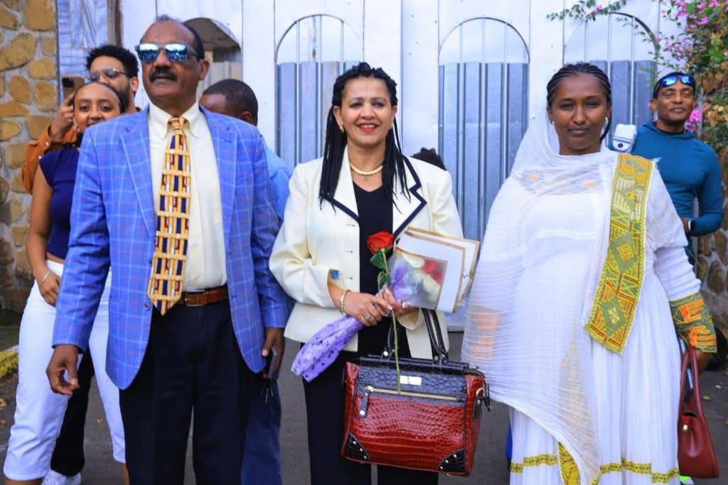 a group of people standing next to each other at Eniye Takele Cultural House in Gonder