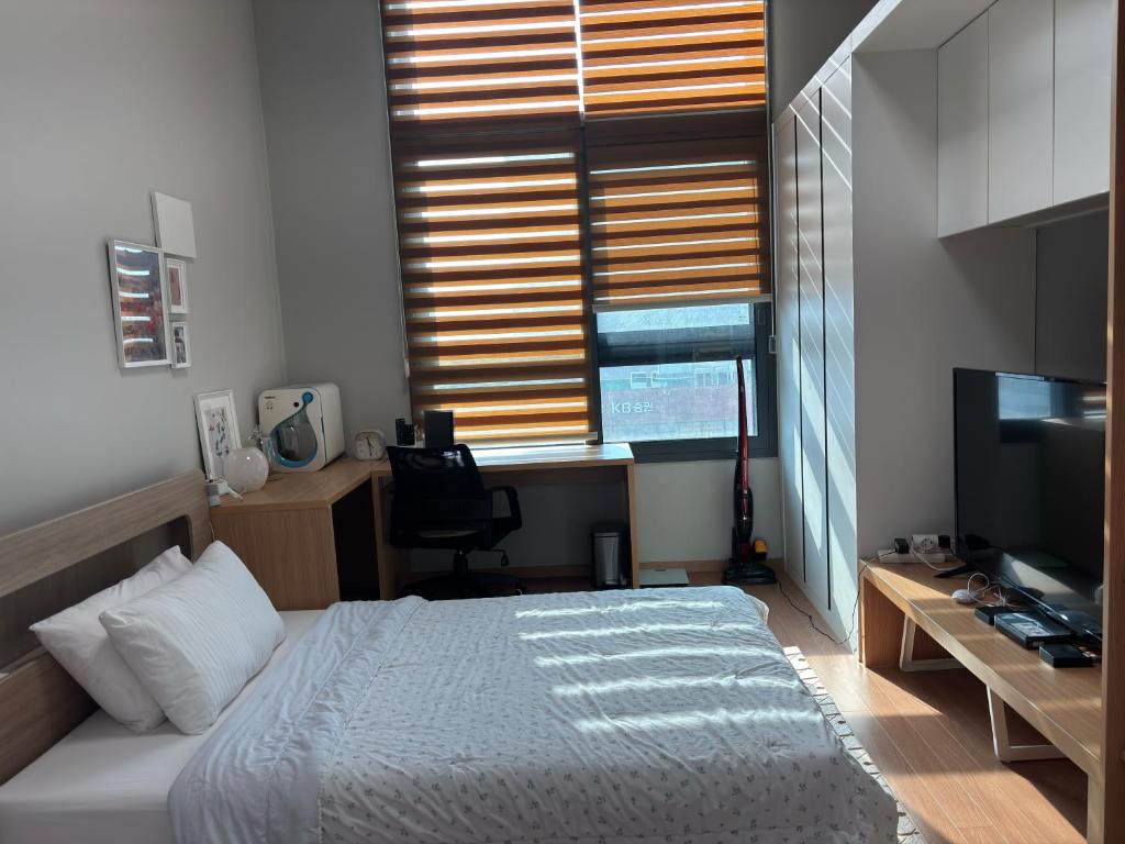 TV/trung tâm giải trí tại Modern Style Duplex Room