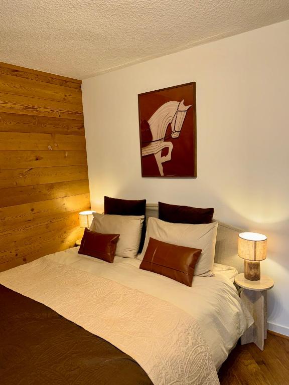 Llit o llits en una habitació de LiHam Alpine Suite