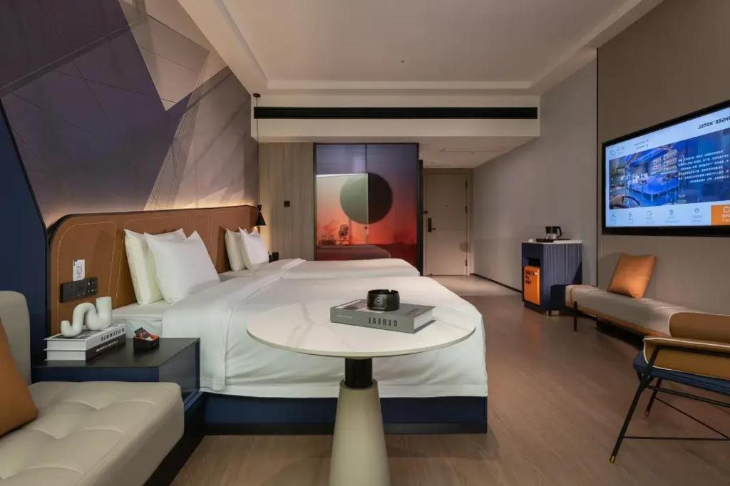 Voodi või voodid majutusasutuse FunGee Hotel Changsha Wuyi Square Metro Station Branch toas