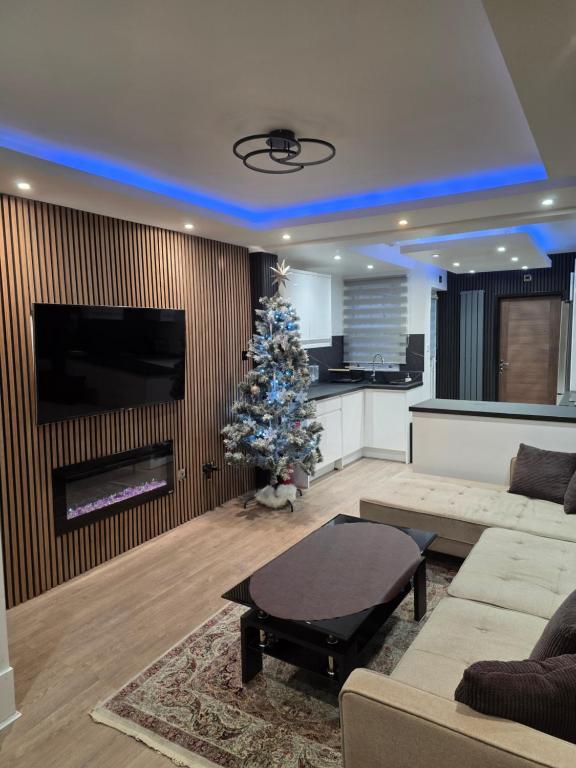 Μια τηλεόραση ή/και κέντρο ψυχαγωγίας στο Uniq 3 Bedroom House in central Watford ,15min to London Euston , close to Harry Potter