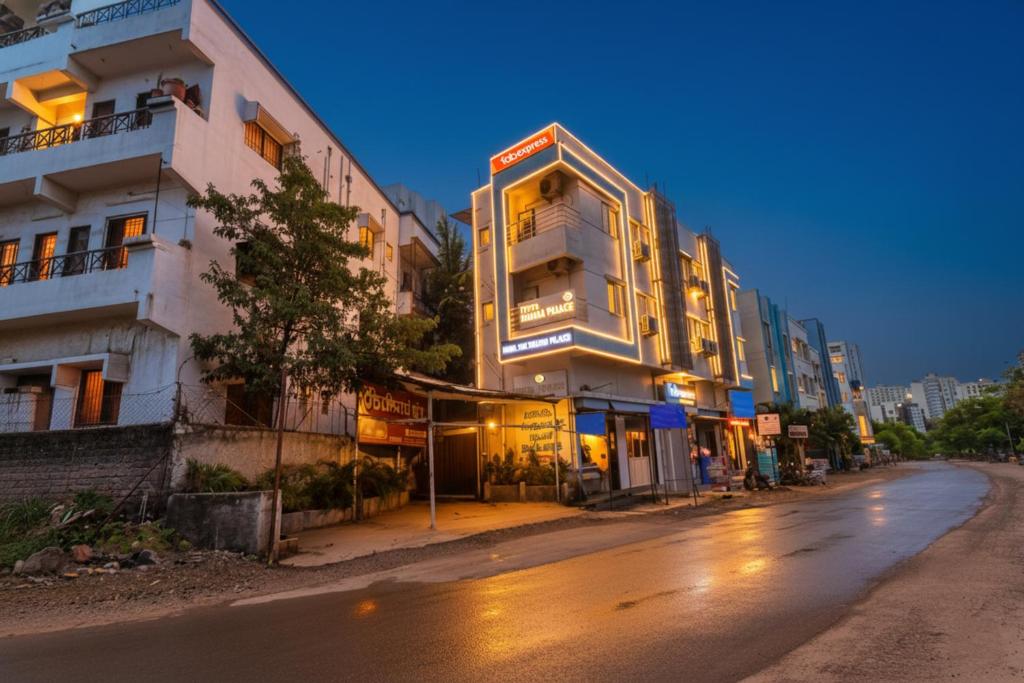 an empty street in a city at night at Via Shivsai Palace - Nr Shree Krishna Temple in Kharadi
