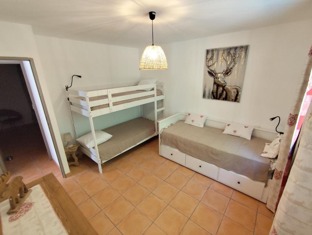 Postel nebo postele na pokoji v ubytování Gîte des Chênes